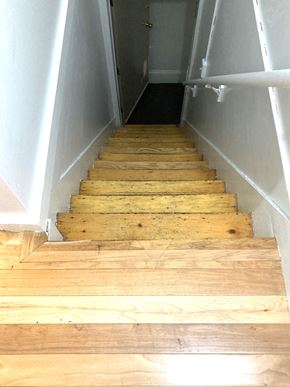 Portland apartment for rent - the stairs are made of wood and are going up and down