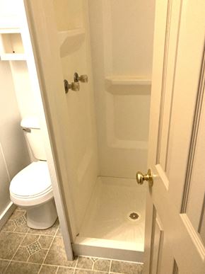 Portland apartment for rent - a small bathroom with a shower and a toilet