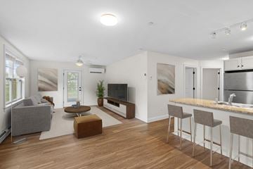Westbrook apartment for rent - a living room with a couch and a table