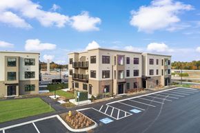 Scarborough apartment for rent - Modern apartment buildings with parking lot and landscaping at Carriage Walk Apartments, Scarborough, ME 04074