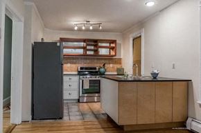 Portland apartment for rent - a kitchen with a refrigerator and a sink