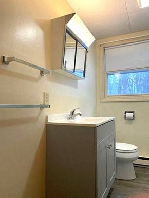 Gorham apartment for rent - a bathroom with a sink and a toilet