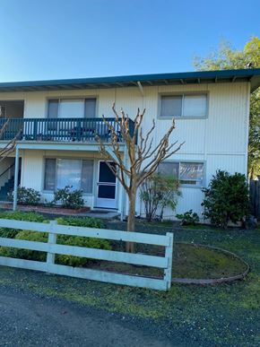 Sonoma apartment for rent - a white fence in front of a white house