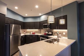 Menlo Park apartment for rent - a kitchen with a large island and stainless steel appliances
