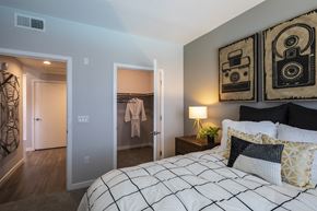 Menlo Park apartment for rent - a bedroom with a bed and a nightstand with a lamp
