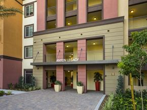 Tustin apartment for rent - a building with a sign that says airport legacy on it