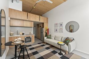 Sacramento apartment for rent - A kitchen with a table and a couch.