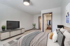 San Francisco apartment for rent - a bedroom with a large bed and a tv