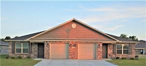 Bentonville apartment for rent - a brick house with two garage doors