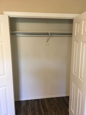 Bentonville apartment for rent - the closet in the master bedroom is empty and has a sliding door