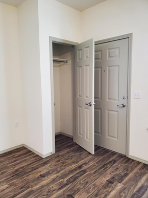 Springdale apartment for rent - an empty room with two doors and a closet