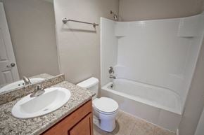 Bend townhouse for rent - a bathroom with a sink toilet and a shower