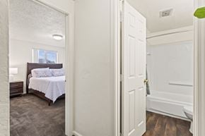 Springfield apartment for rent - A bedroom with a bed and a window.