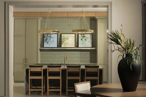Austin apartment for rent - A dining room with a table, chairs, and a vase on it.