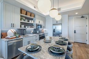 Atlanta apartment for rent - an open kitchen and dining room with a granite counter top