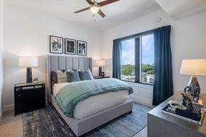 Atlanta apartment for rent - a bedroom with a large window and a bed