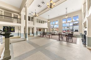 Spokane apartment for rent - A large open space with tables and chairs and a balcony at 206 Flats Apartments, Spokane, WA, 99201