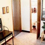 Lancaster apartment for rent - a living room with a piano and a door to a bathroom