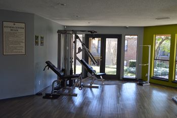Fitness center with strength equipment and glass doors