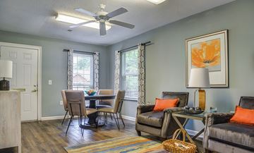 Marietta apartment for rent - A living room with a dining table and chairs.