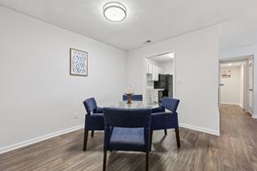 Clarkston apartment for rent - A dining room with a table and chairs.