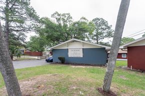 Pensecola apartment for rent - A small building with a sign that says "JACKSON" on it.