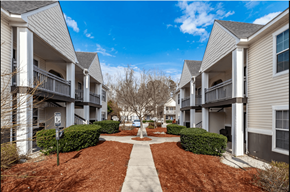 Augusta apartment for rent - Apartment complex with a walkway in the middle.