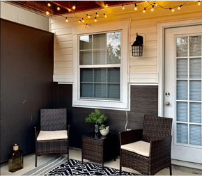 Augusta apartment for rent - A patio with a chair, table, and a plant.