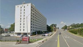 Little Rock apartment for rent - a large white building on the side of a road