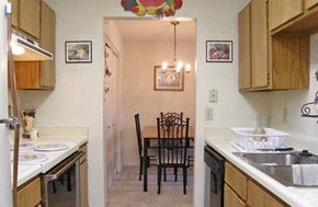 Greenville townhouse for rent - a kitchen and dining room with a table and chairs
