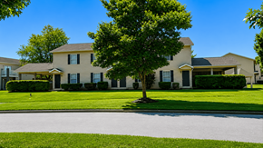Hickory apartment for rent - A large house with a tree in front of it.