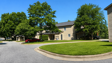 Hickory apartment for rent - A residential area with houses and trees.