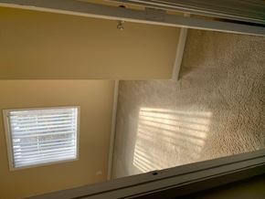 Atlanta apartment for rent - A window with white blinds is on the wall.