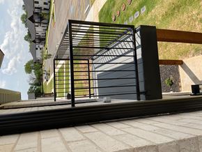 Bentonville apartment for rent - a large black metal gate in front of a building