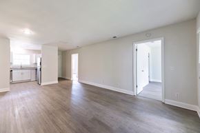 Savannah apartment for rent - an empty living room with white walls and wood floors