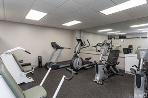 North Little Rock apartment for rent - a gym with cardio machines and other exercise equipment