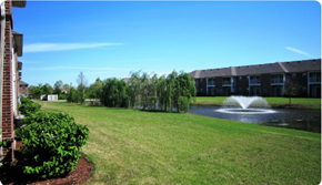 Memphis apartment for rent - A fountain in the middle of a grassy area.
