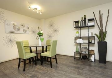 Houston apartment for rent - A dining room with a table and chairs.