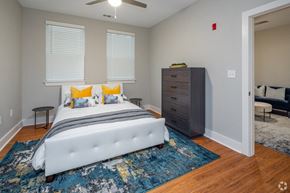 Nashville apartment for rent - a bedroom with a bed and a dresser