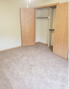 Conway apartment for rent - a bedroom with a closet and a carpeted floor