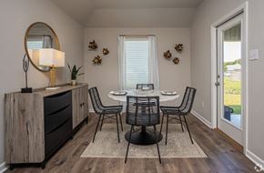 Maurice apartment for rent - a dining room with a table and chairs