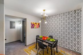 Greensboro apartment for rent - A dining room with a table set for two.