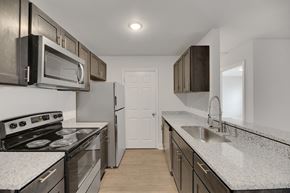 Savannah apartment for rent - a kitchen with granite counter tops and stainless steel appliances