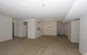 Hendersonville apartment for rent - an empty living room with white walls and white cabinets