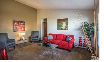 Little Rock apartment for rent - a living room with a red couch
