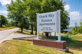 Branson apartment for rent - a sign that says oak sky estates apartments