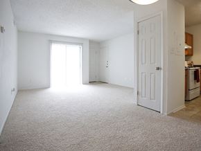 Destrehaun apartment for rent - a bedroom with an open door and a kitchen in the background