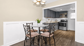 Stone Mountain apartment for rent - a kitchen with a round table with four chairs