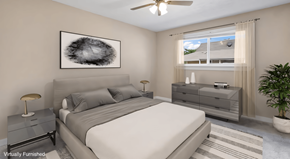 Stone Mountain apartment for rent - a bedroom with a white bed and a ceiling fan