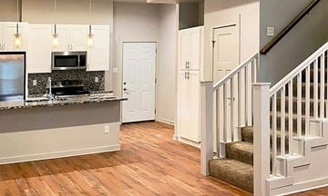 Alexander apartment for rent - A kitchen with a stove top oven and a counter top.